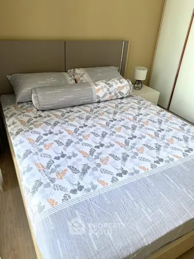 Cozy bedroom with stylish bedding and modern decor