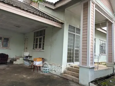 Charming suburban house with spacious porch and classic architectural design