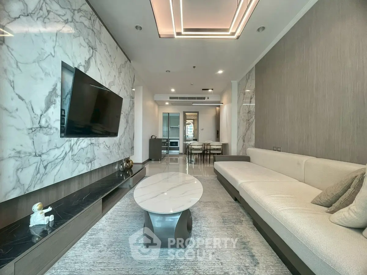 Luxurious modern living room with marble accents and sleek furniture