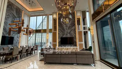 Luxurious high-rise living room with stunning city views and elegant modern decor.