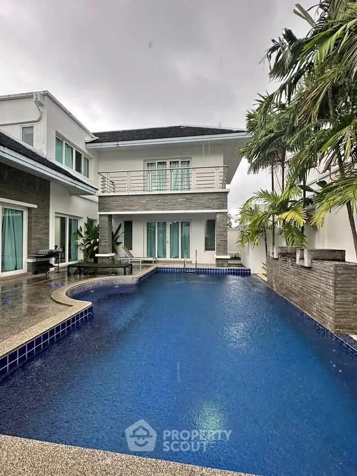 Luxurious modern home with private pool and elegant architecture, perfect for upscale living.