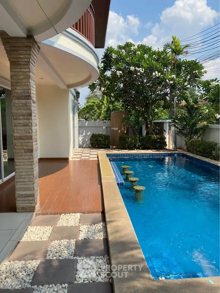 Luxurious home with private pool and stylish outdoor area, perfect for relaxation and entertainment.