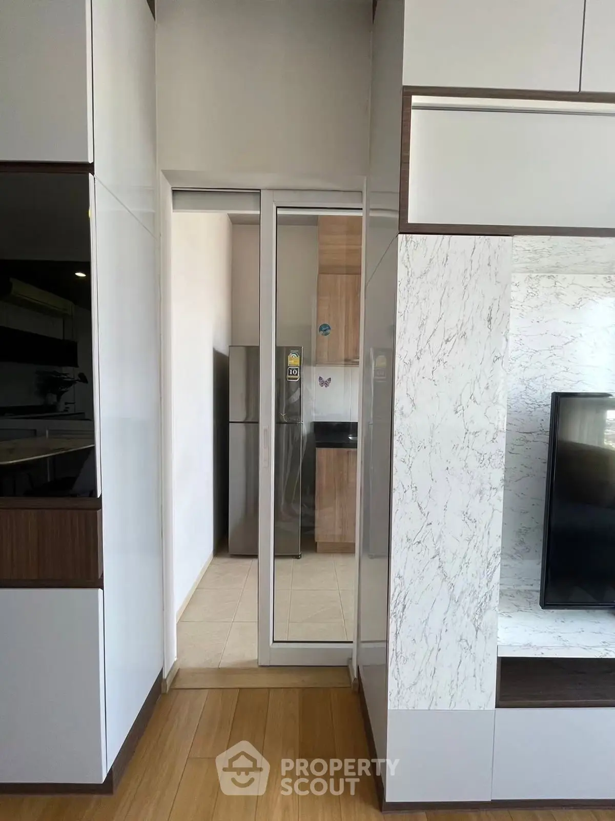 Modern kitchen with sleek cabinetry and stainless steel appliances