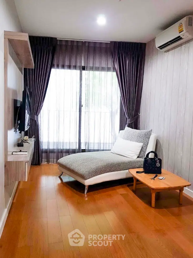  1 Bedroom Condo at Condolette Dwell Sukhumvit 26 Livingroom