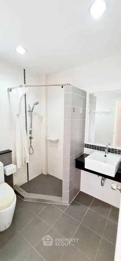 Modern bathroom with sleek design and spacious shower area