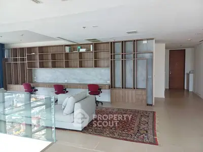 Spacious modern living room with city view and elegant decor