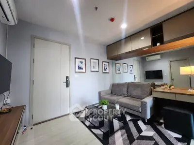 Modern living room with stylish decor and comfortable seating in a contemporary apartment.