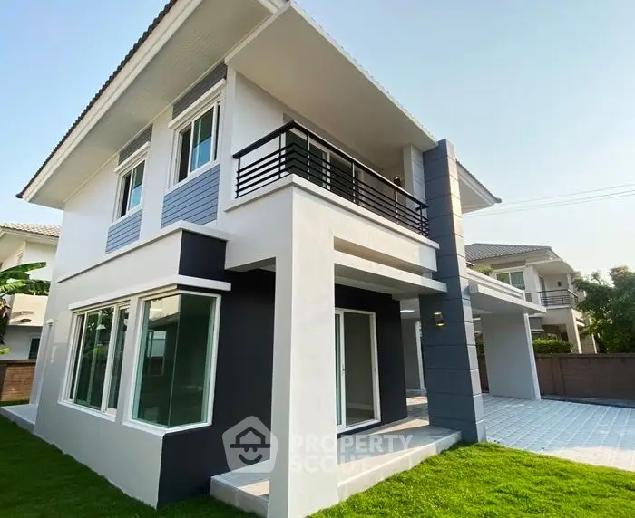 Modern two-story house with sleek design and spacious balcony