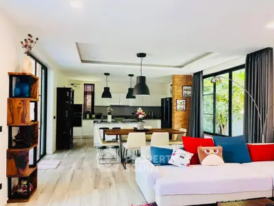 Spacious modern living room with open kitchen and stylish decor