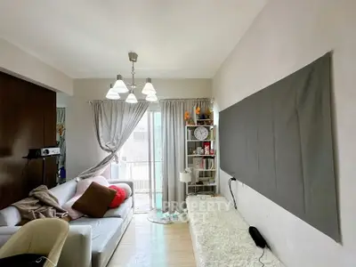 Cozy living room with modern decor and ample natural light