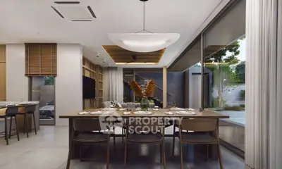 Luxurious modern dining room with large windows and elegant decor