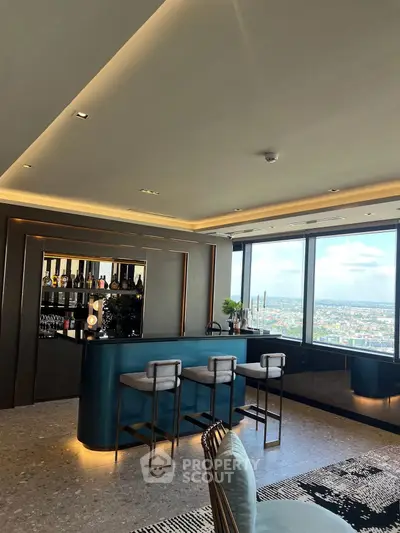 Luxurious high-rise living room with panoramic city views and stylish bar area.