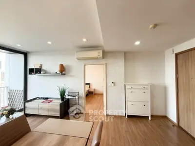 Modern living room with stylish decor and wooden flooring