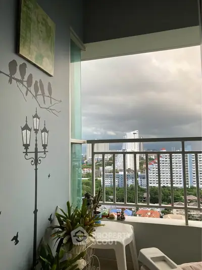 Charming balcony with city view, perfect for relaxation and enjoying the skyline.