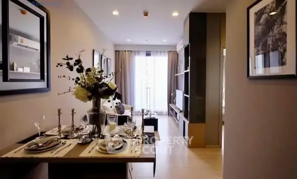 Stylish modern living room with elegant dining setup and natural light.