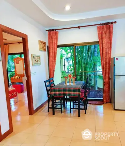 Charming dining area with garden view and vibrant decor