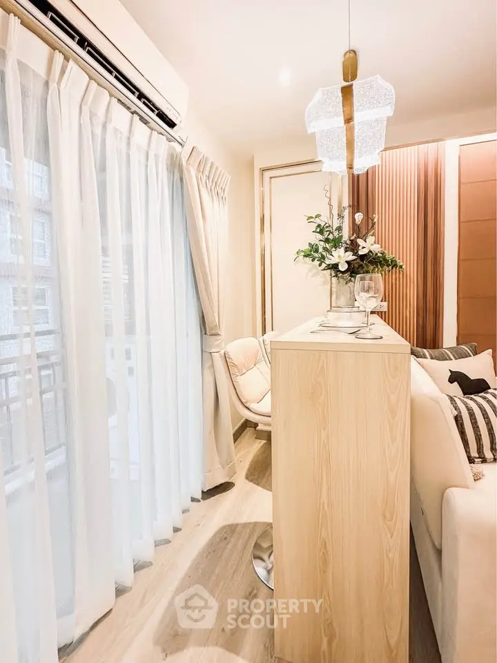 Elegant living room with modern decor and natural light