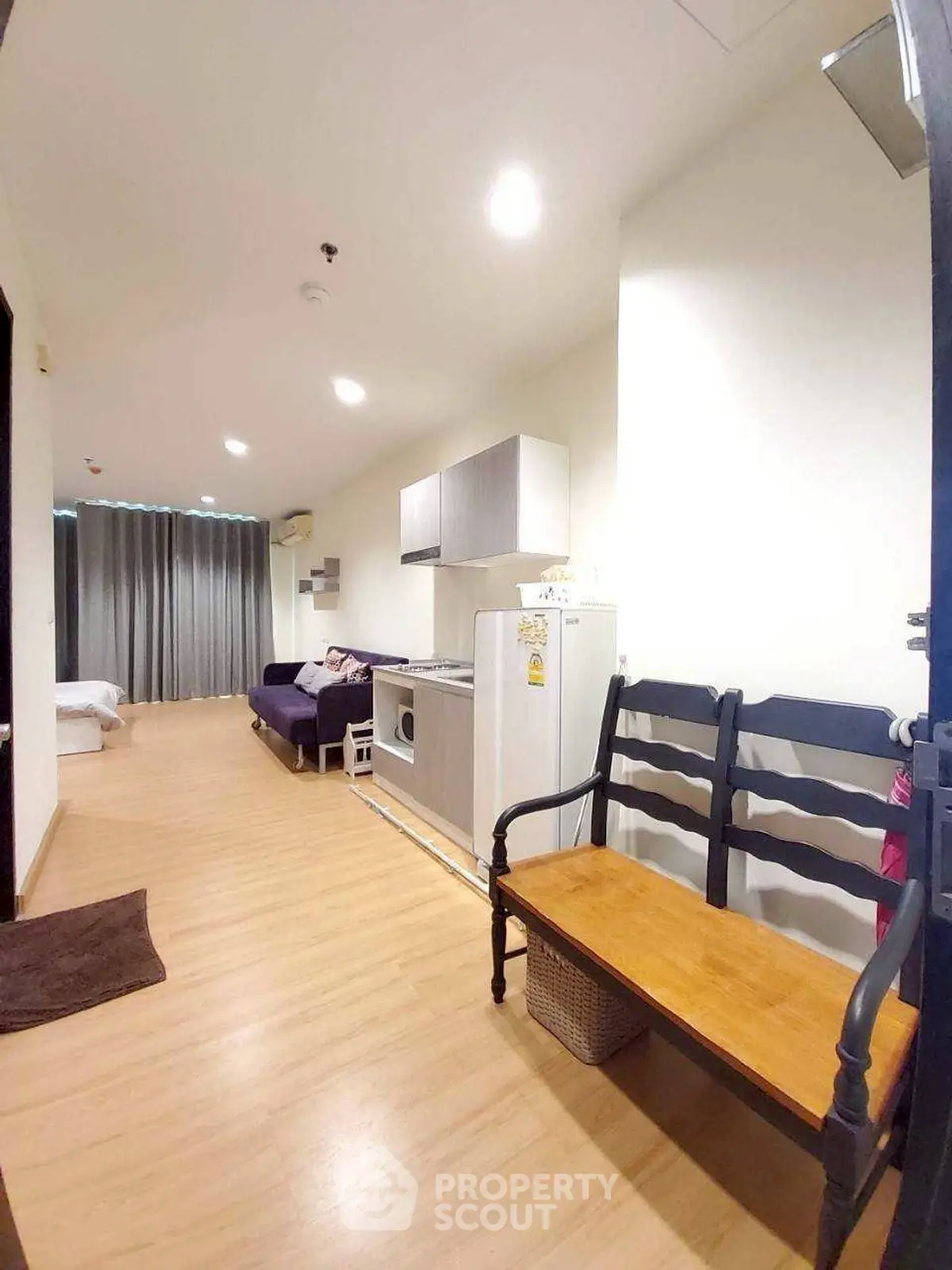 Modern studio apartment with open layout and stylish furnishings