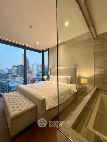Luxurious bedroom with stunning city view and elegant decor