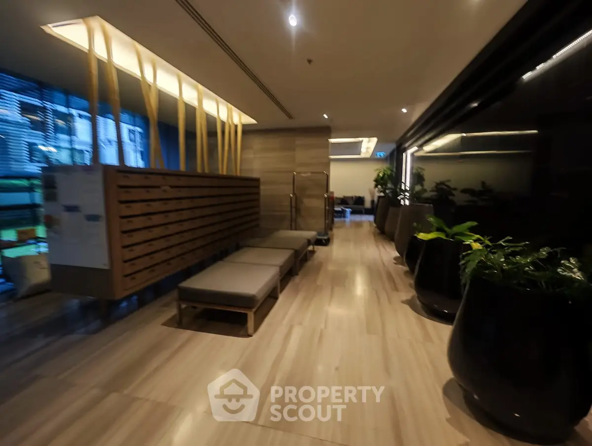 Modern building entrance with sleek design and ambient lighting