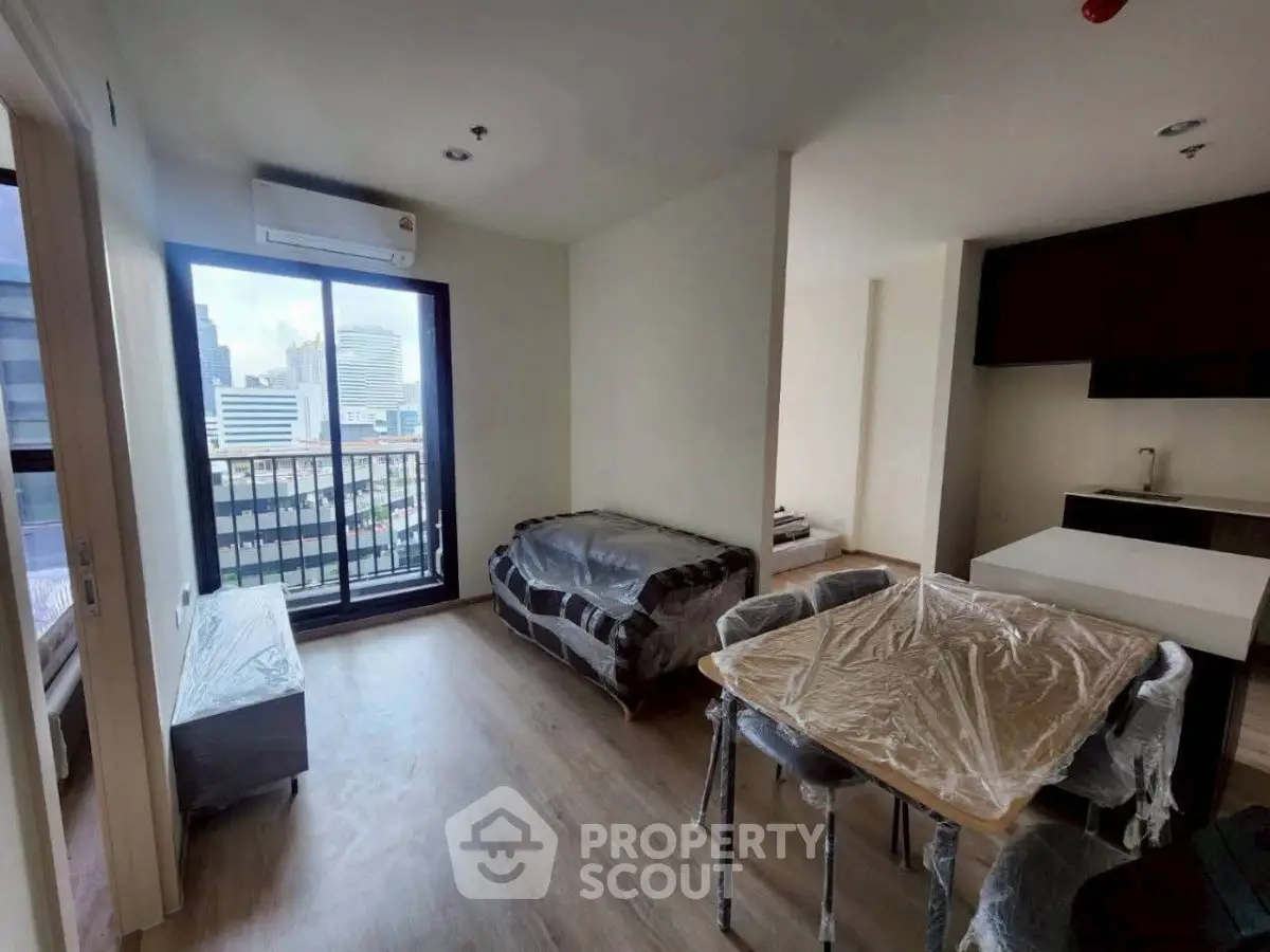 Modern living room with balcony view in urban apartment