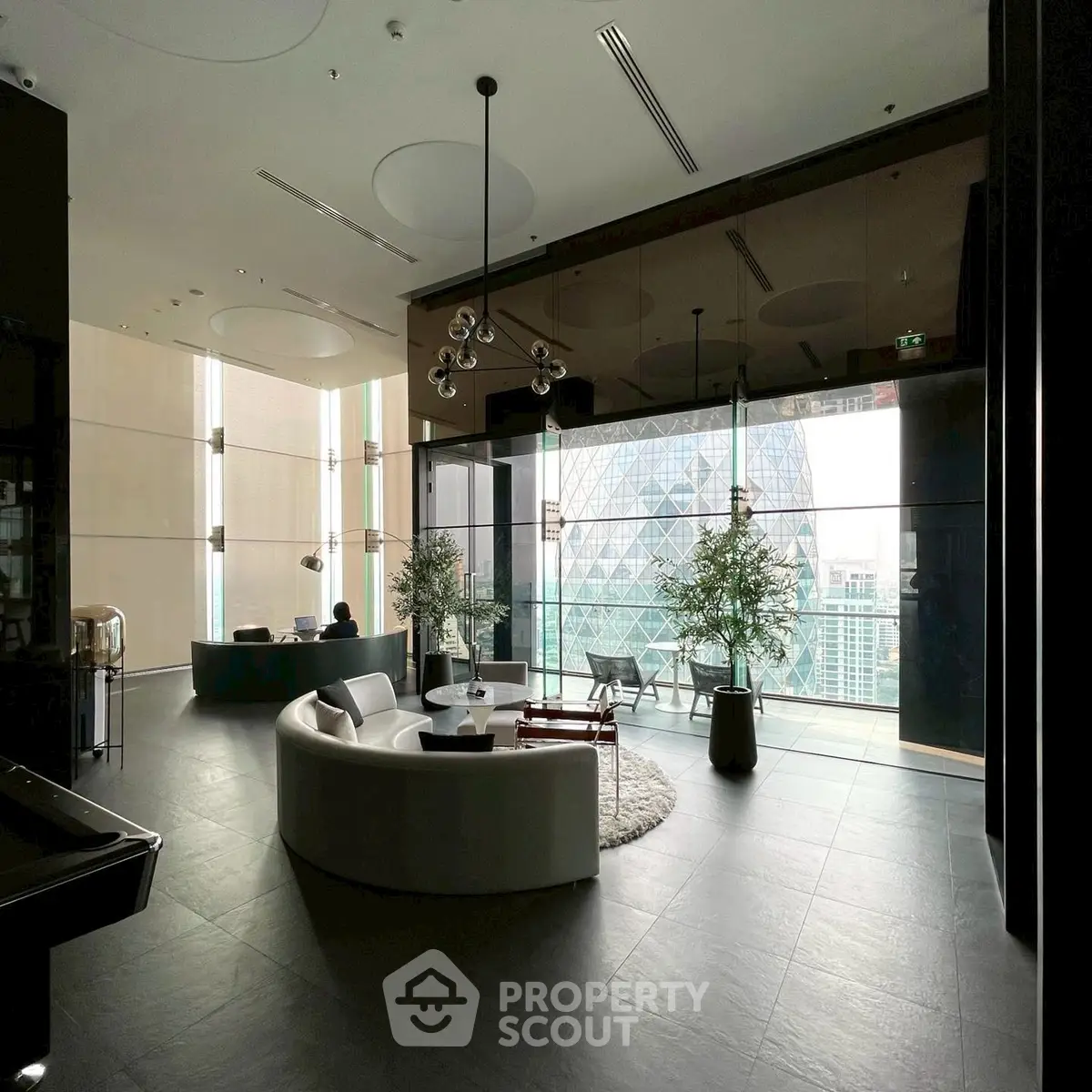 Luxurious modern living room with stunning city view and elegant decor