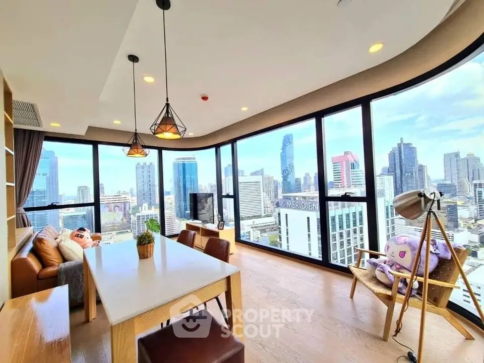 Stunning corner unit with panoramic city views and modern interior design