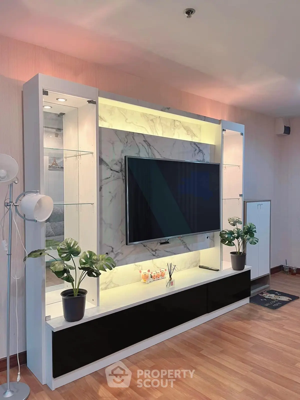 Modern living room with stylish TV unit and elegant decor