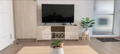 Modern living room with sleek TV stand and stylish decor