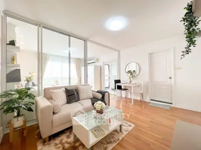 Bright and modern living room with cozy seating and elegant decor