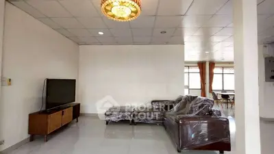 Spacious living room with modern furniture and natural light