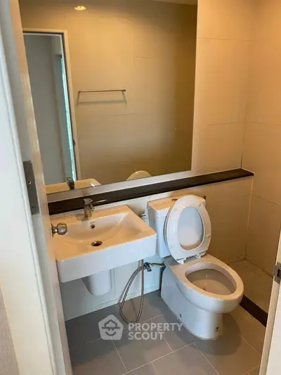 Modern bathroom with sleek fixtures and neutral tones