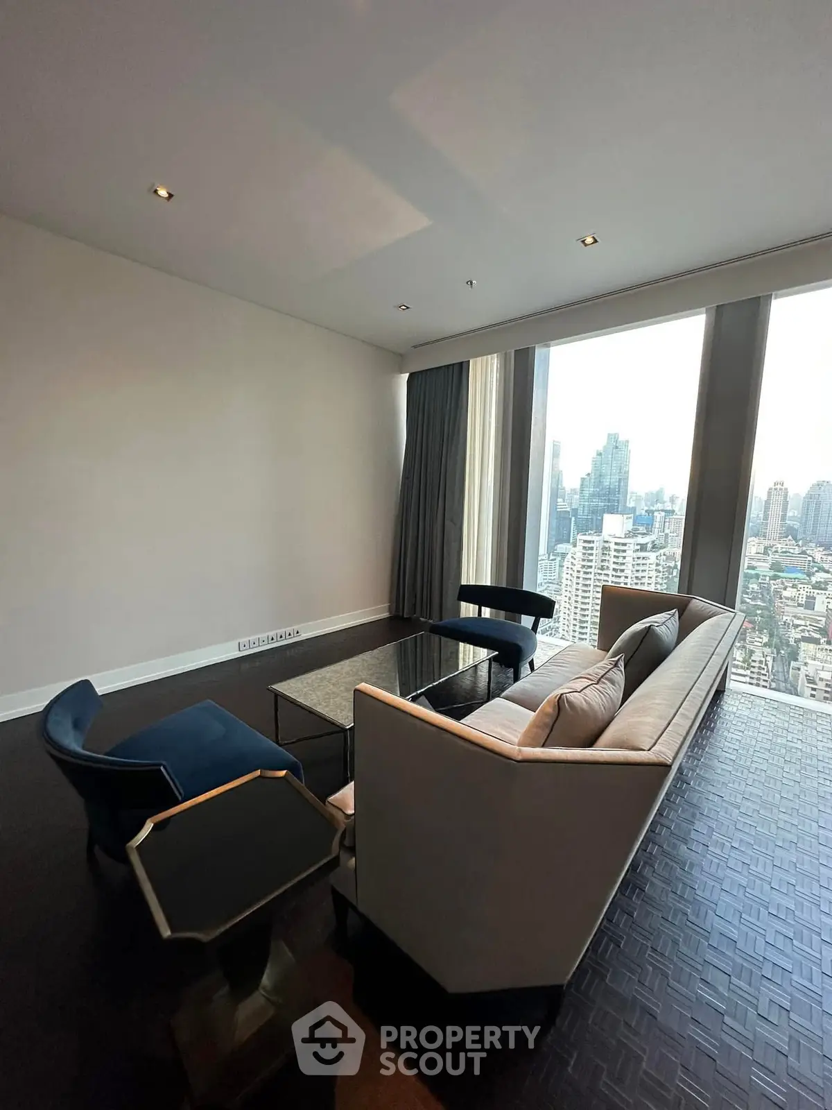 Luxurious living room with panoramic city view and modern furniture