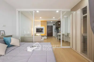 Modern studio apartment with open living area and stylish decor