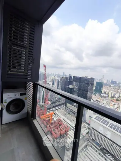 Stunning high-rise balcony view with cityscape and washing machine