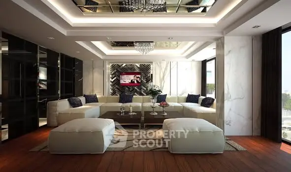 Luxurious modern living room with elegant decor and spacious seating area.