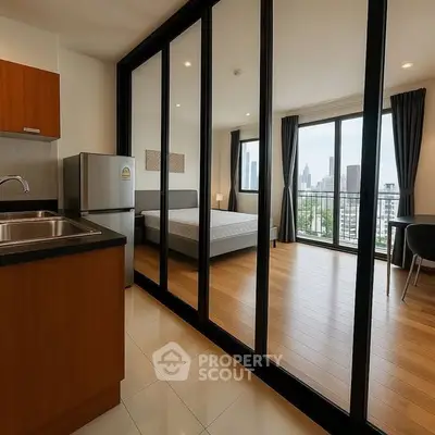 Modern studio apartment with open kitchen and city view