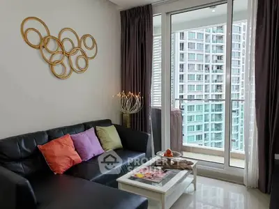 Modern living room with balcony view in high-rise apartment