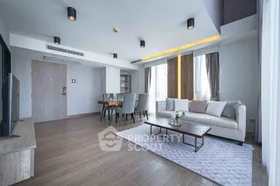 Spacious modern living room with elegant decor and natural light