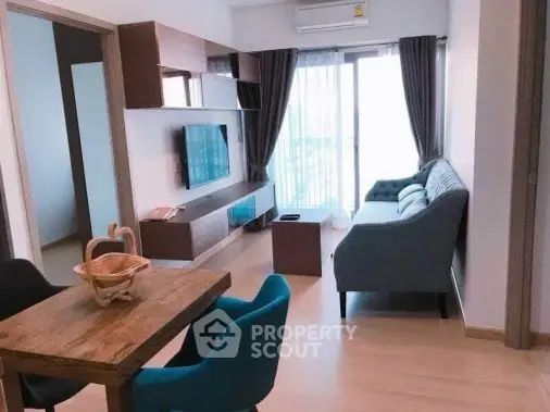 Modern living room with stylish furniture and natural light