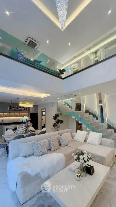 Luxurious modern living room with high ceilings and elegant decor