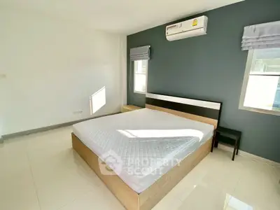 Modern bedroom with sleek design and natural light