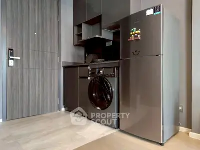 Modern kitchen with sleek appliances and stylish cabinetry