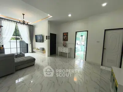 Spacious modern living room with elegant decor and natural light