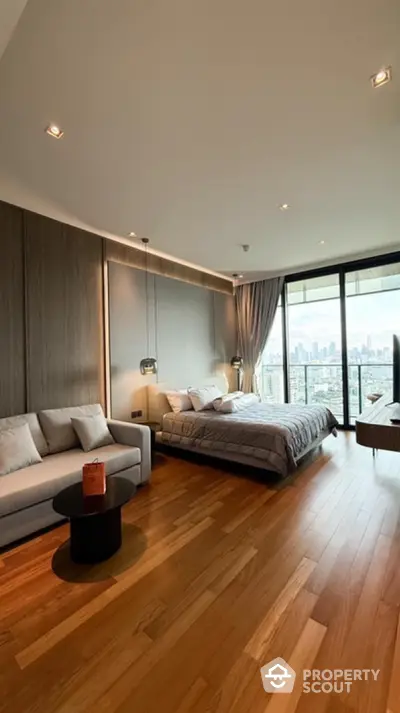 Luxurious bedroom with stunning city view and elegant wooden flooring