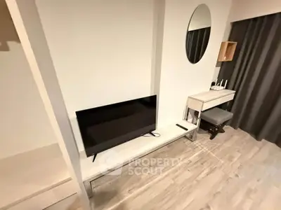 Modern living room with sleek TV setup and stylish decor
