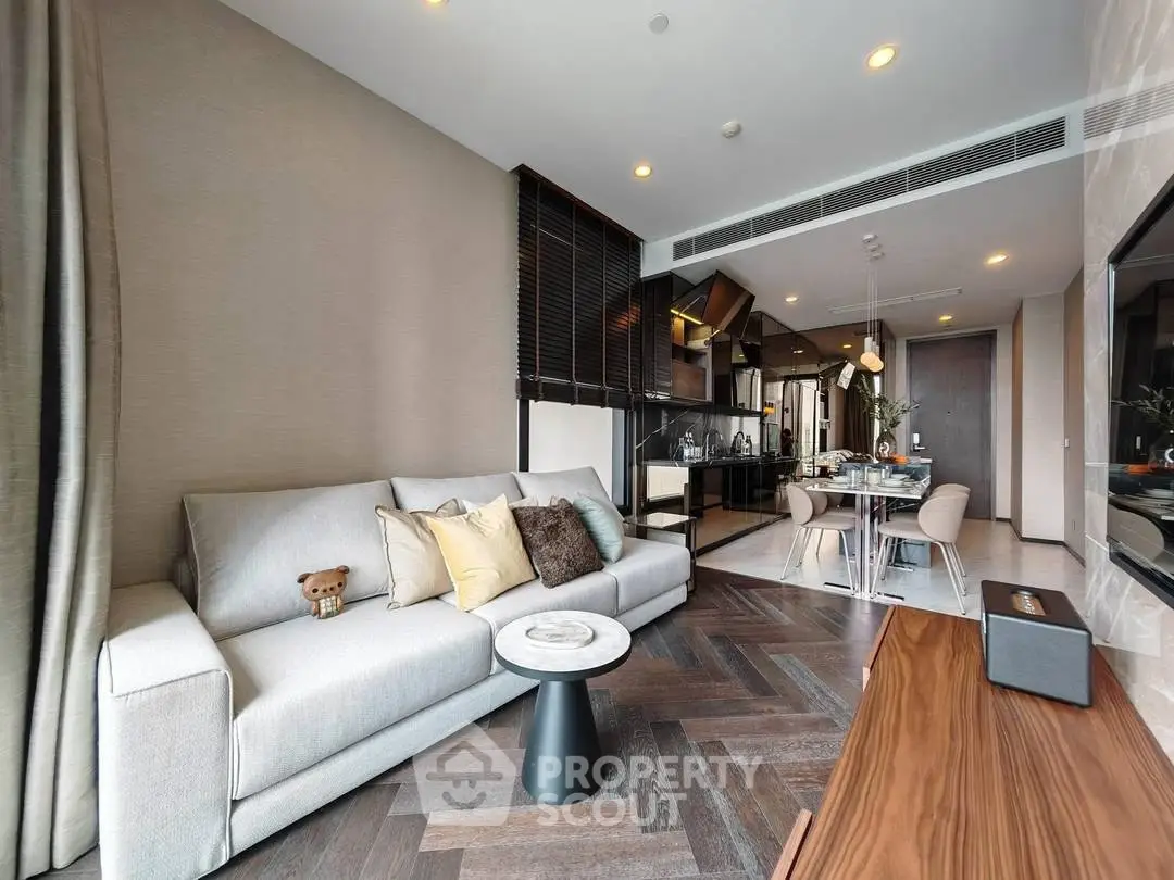 Modern living room with stylish decor and open kitchen layout