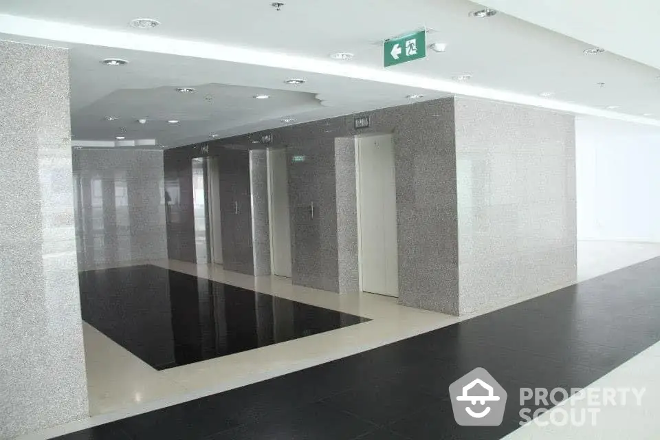 Modern building elevator lobby with sleek design and polished floors