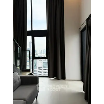 Modern high-rise apartment with floor-to-ceiling windows and city view