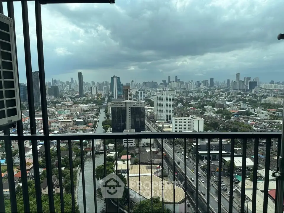 Stunning cityscape view from high-rise balcony with expansive skyline and urban landscape.